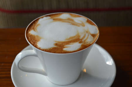 Cup of hot coffee latteの写真素材
