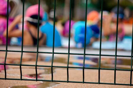 steel fence swimming pool at schoolの写真素材