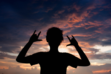 silhouette of young ladyの写真素材