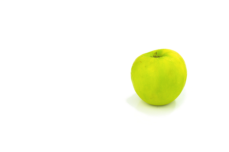Real organic Green Apple isolated on white backgroundの写真素材