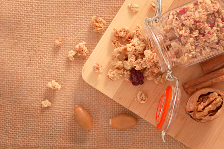 Food breakfast concept Spot focus Organic Muesli or Granola on wooden board with copy spaceの写真素材