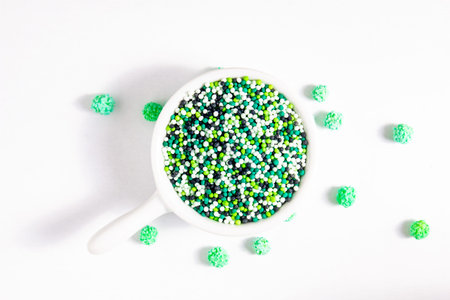 Food decoration item concept green shade color SPARKLING sugar on with background