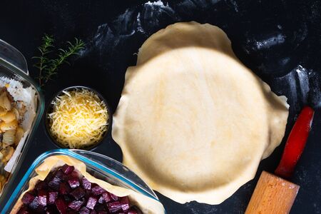 Healthy food concept preparation for Homemade rustic organic roasted beets and caramel galette pie with copy spaceの写真素材