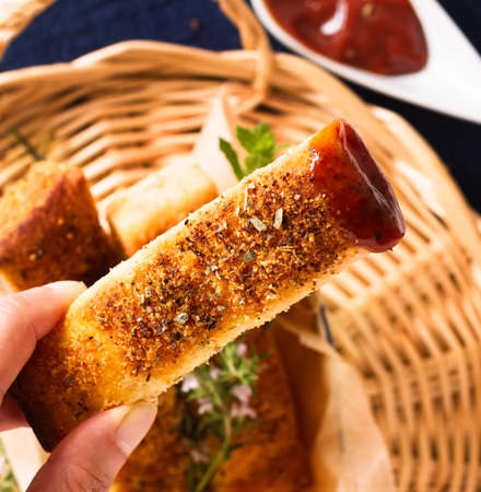 Food appetizer ideas for party concept homemade organic garlic bread stick in Eco wood Tray box packagingの写真素材