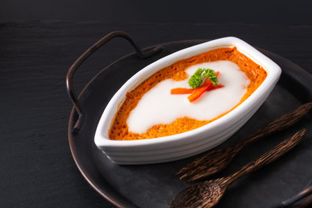 Asian food concept Thai Steamed Curried Fish, Steamed Red Curry Custard Hor Mok in white ceramic...