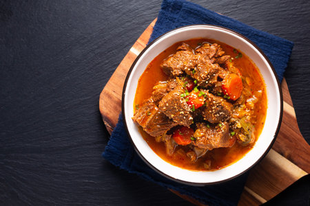 Food concept Korean spicy Beef stew on black background with copy spaceの写真素材