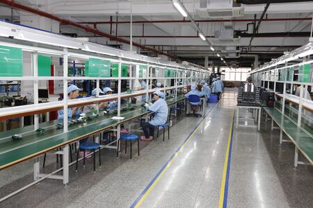 People walking in factoryのeditorial素材