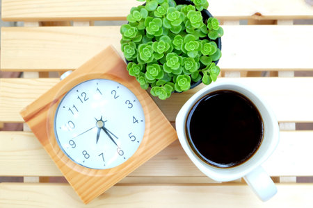 hot coffee on wooden table