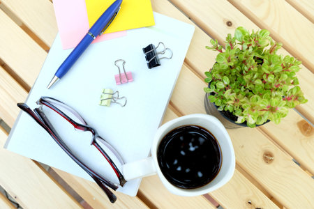 note book on the wooden table