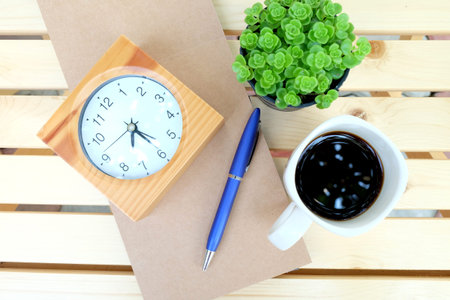 note book on the wooden table