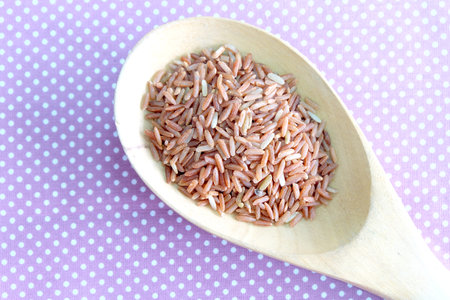 red rice in wooden wareの写真素材
