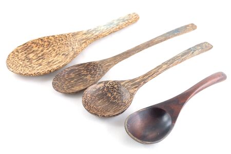 wooden spoon on wooden backgroundの写真素材