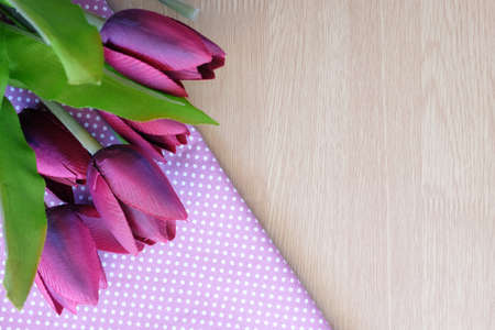 flower on wooden and dot cloth backgroundの写真素材