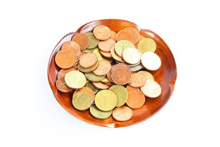coin in wooden spoon in business concept