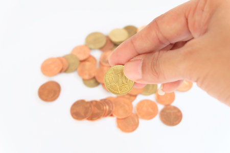 coin in wooden spoon in business concept