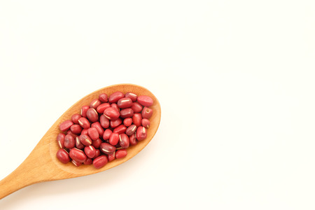 red bean in wooden spoonの写真素材