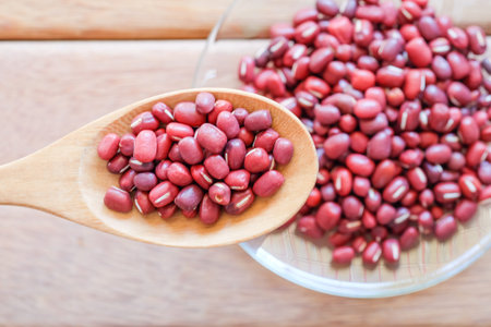 red bean on wooden background with healthy concept
