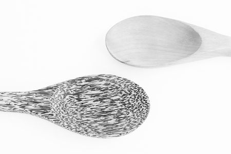wooden spoon with black and white colorの写真素材