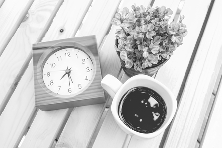 black coffee on wooden table with black and white colorの写真素材