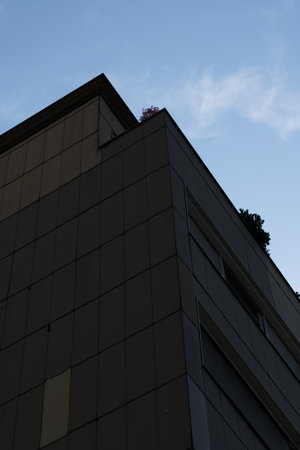 Brown modern architecture building shot from the bottom upの写真素材