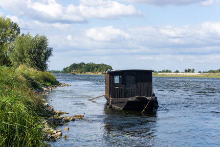 Old boat on the Loire river. Gennes-Val-de-Loire, Loire, Loire, Maine-et-Loire. French.の写真素材