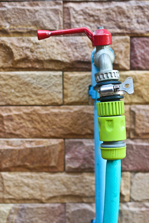 Water Faucet with Long Tap for Water Gardening の写真素材