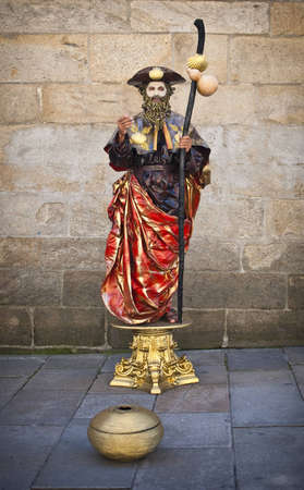 Santiago de Compostela, Spain - August 15, 2011: Street performer dressed as Apostle Santiago in the street near the cathedral of Santiago de Compostelaのeditorial素材