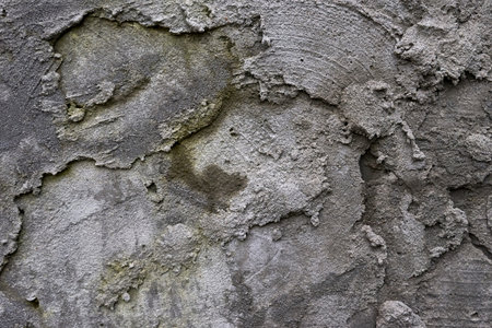 Cracked concrete texture closeup background