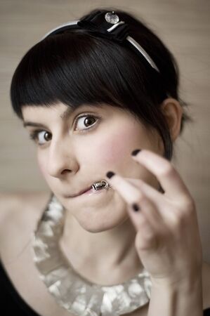funny portrait of a young woman with zipperの写真素材