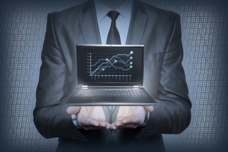 Graph in the hands of businessmenの写真素材