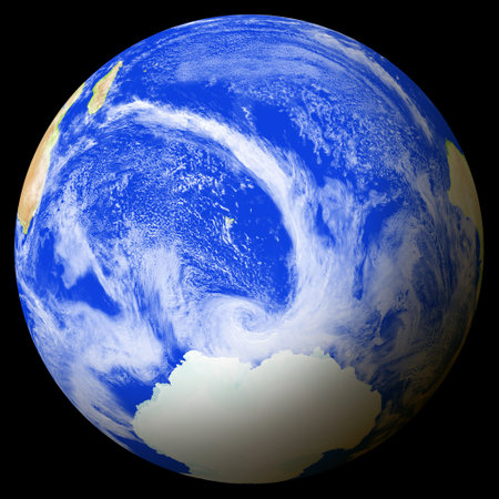 Close view of the earth from space showing Heard Island and McDonald Islands in the center of the image. Light clouds cover parts of the earth. Map data from Natural Earth.の写真素材