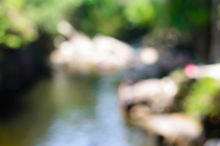 Blurred background with Forest and lake in the natureの写真素材