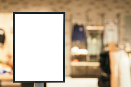 Blank mock up of vertical poster billboard sign with copy space for your text message or content in modern shopping mall.の写真素材
