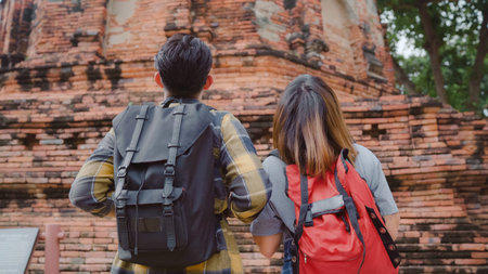 Traveler Asian couple spending holiday trip at Ayutthaya, Thailand, backpacker sweet couple enjoy...