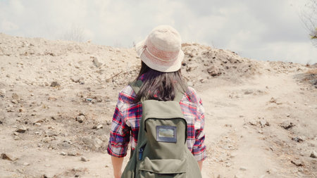 Hiker Asian backpacker woman walking to top of mountain, Female enjoy her holidays on hiking...