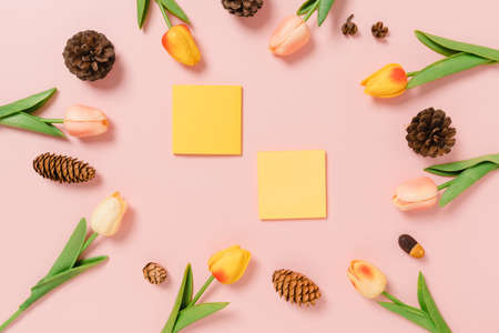 Creative flat lay photo of travel vacation spring or summer tropical fashion. Top view beach accessories on pastel pink color background with blank space for text. Top view copy space photography.の写真素材