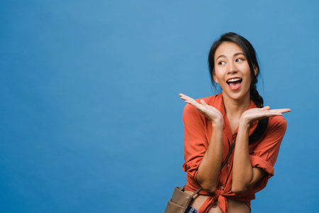 Young Asia lady feel happiness with positive expression, joyful surprise funky, dressed in casual...