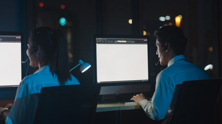 Millennial Asia young call center team or customer support service executive using computer and...