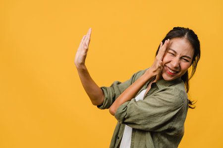 Young Asia lady feel happiness with positive expression, joyful surprise funky, dressed in casual...