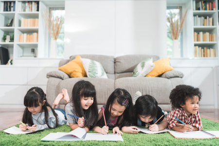 Group of children using tablet in classroom, Multi-ethnic young boys and girls happy using...