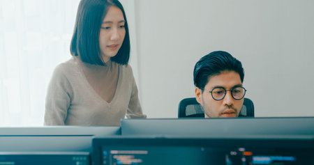 Group Adult Asia male, female freelance meeting write prompt AI bot IT app smart program nomad,...