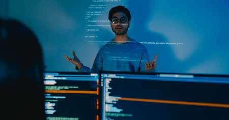 Group adult Asia male software developers mentor leader manager talk strategy plan to executive write prompt AI bot IT app program nomad, video game, designer, data center. Projecting slideshow code.の写真素材