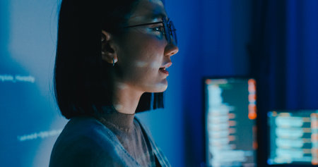 Group adult Asia female software developer mentor leader manager talk strategy plan to executive write prompt AI bot IT app program nomad, designer, data center.の写真素材