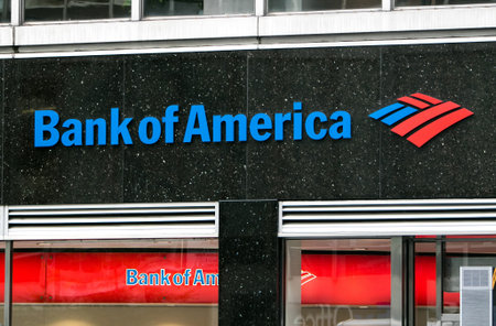 New York, July 19, 2016: A Bank of America sign on the black polished surface over one of their many...