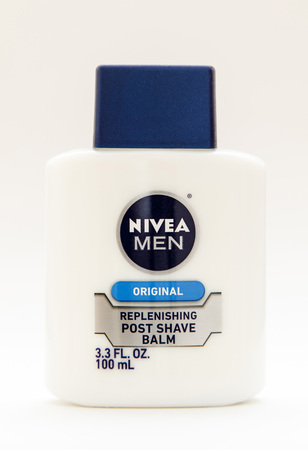 New York, January 25, 2017: A bottle of Nivea post shave balm stands against white background.のeditorial素材
