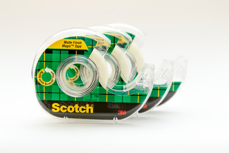 New York, January 25, 2017: Three rolls of transparent scotch tape isolated on white background.のeditorial素材