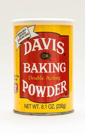 New York, January 30, 2017: A pack of Davis baking powder isolated on white background.のeditorial素材