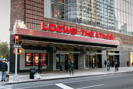 New York, November 28, 2016: People walk by the entrance to a Loews Theater on Upper West Side.のeditorial素材