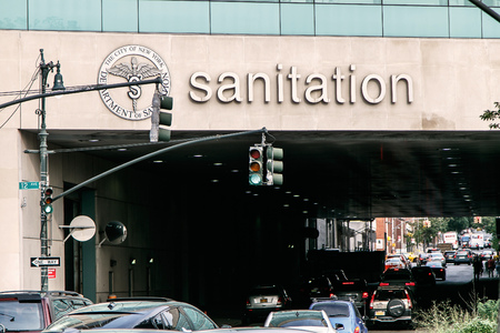 New York, August 10, 2017: Cars drive under the NYC Sanitation Department building on the West Side of Manhattan.のeditorial素材