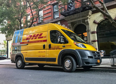 New York, August 17, 2017: DHL van is parked in the streets of Manhattan.